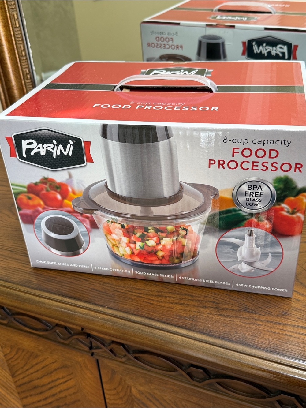 Parini 8-Cup Food Processor. Chops slice shred and purer. 4 stainless blades.